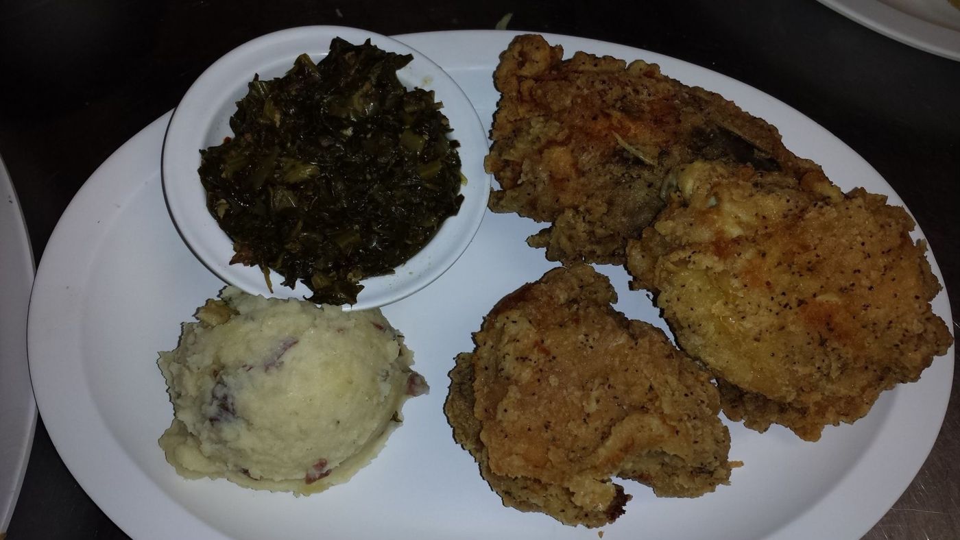 Fried chicken, collard greens and mashed potatoes